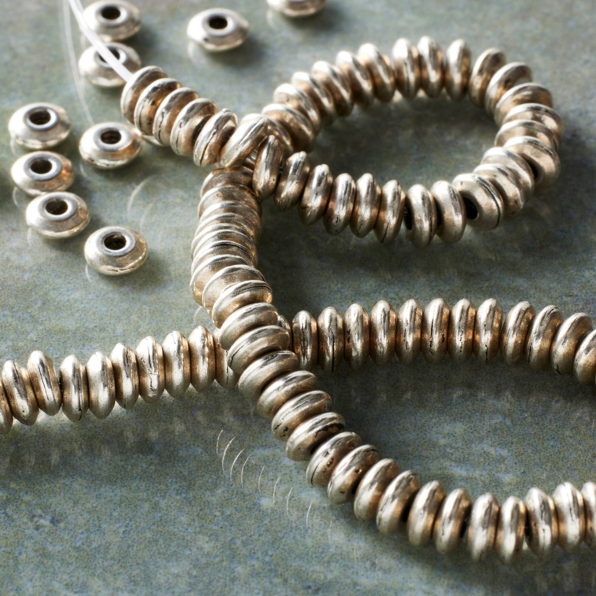 Silver Smooth Rondel Metal Beads, 4mm by Bead Landing™